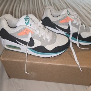 Nike Air Max Sneakers in White, Black, Teal, and Orange